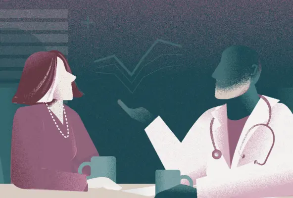 Physician and patient discussing patient engagement strategies